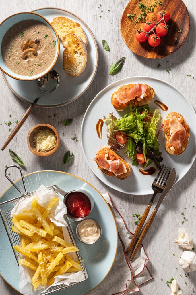 Food Photography Singapore of mushroom soup, bruschetta and fries